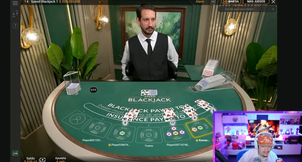Mesa de blackjack en vivo con fichas y cartas en 2026